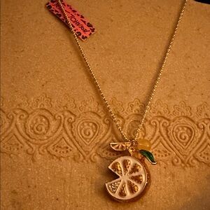 NWT Betsy Johnson Retired 19” Gold  Orange Necklace with charms